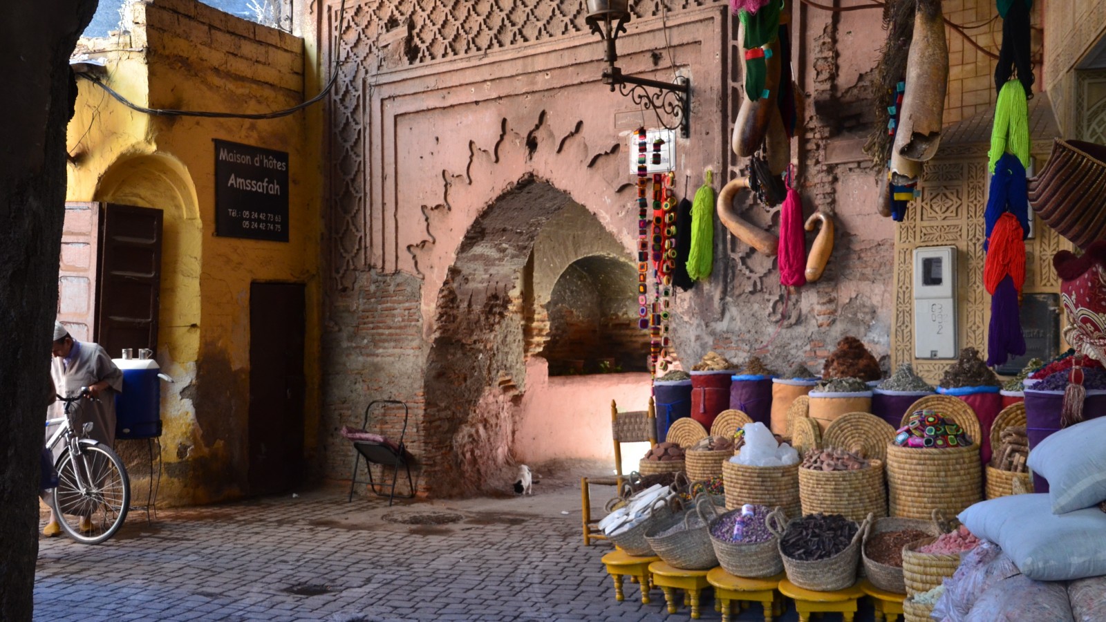 Colourful spices in sacks line the souks within Marrakech's Old Medina