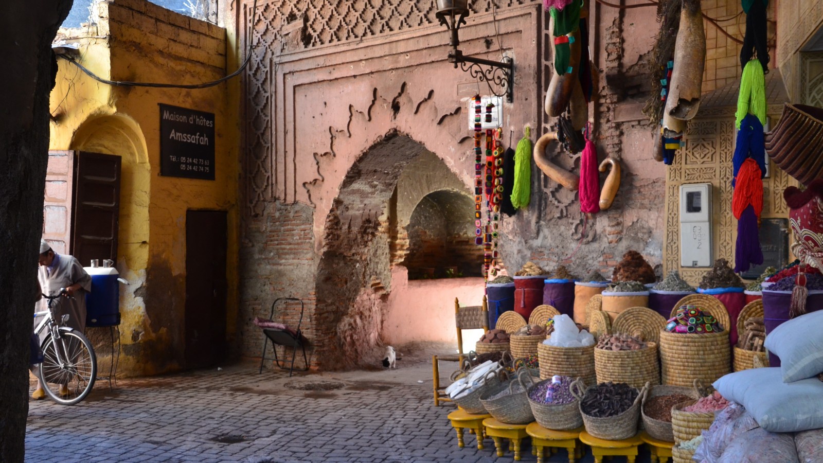 Colourful spices in sacks line the souks within Marrakech's Old Medina