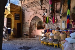 Colourful spices in sacks line the souks within Marrakech's Old Medina