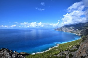 Crete's serene shores are fringed by verdant landscapes