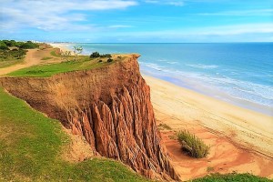 Praia da Falesia is famous for its dramatic red cliffs