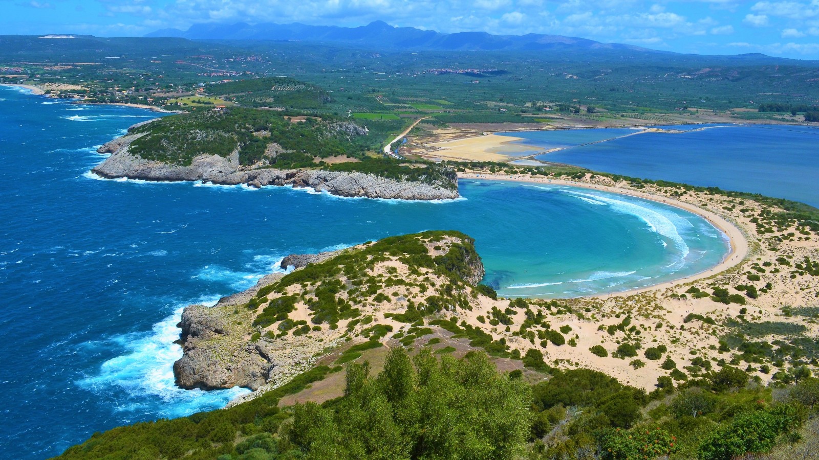 A wonderfully unspoilt cove, Voidokoilia Beach is known to be one of the best beaches in Greece